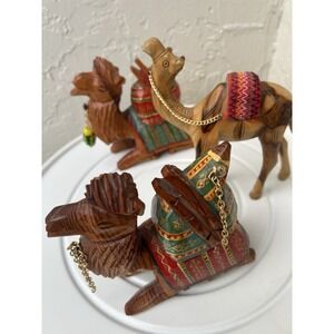 vintage, hand-carved, and hand-painted Set of 3 wooden camel figurines